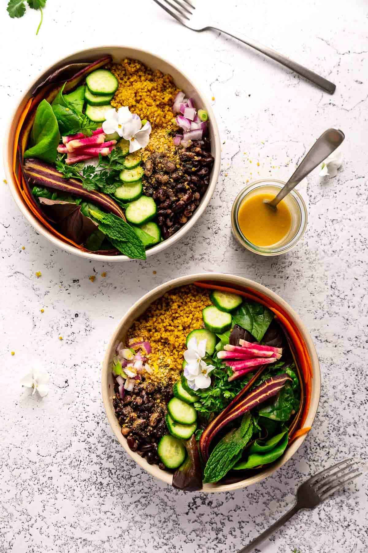 Colorful vegan Buddha bowl with quinoa, vegetables, and beans
